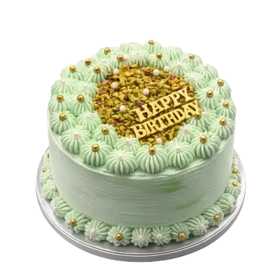 Elegant pastel green pistachio birthday cake decorated with gold edible pearls and a gold 'Happy Birthday' "