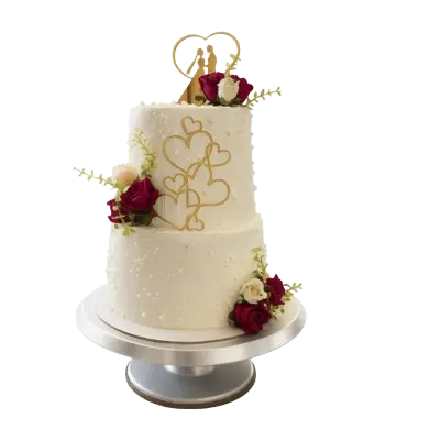 Elegant white cake decorated with fresh red roses, ideal for weddings or special occasions.